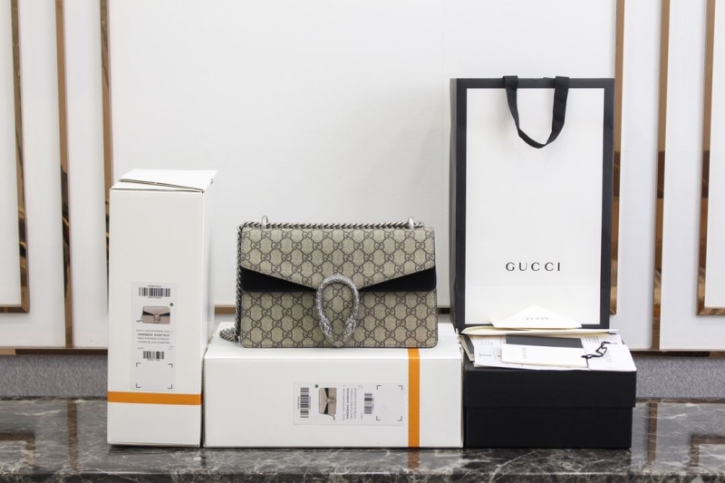 G*u*i satchel bags